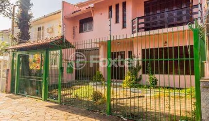 Casa com 5 quartos à venda na Rua Monteiro Lobato, 395, Partenon, Porto Alegre, 381 m2 por R$ 1.600.000