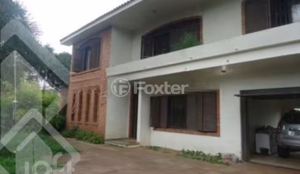 Casa com 5 quartos à venda na Rua Santa Terezinha, 286, Nossa Senhora das Graças, Canoas, 372 m2 por R$ 750.000