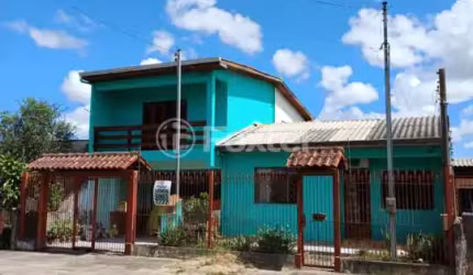 Casa com 3 quartos à venda na Rua Taimbé, 414, Sumaré, Alvorada, 205 m2 por R$ 389.900