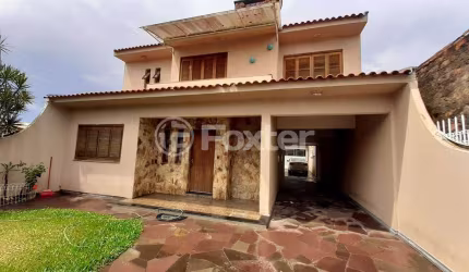 Casa com 3 quartos à venda na Rua Princesa Isabel, 735, Sumaré, Alvorada, 400 m2 por R$ 674.000