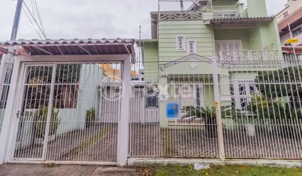 Casa com 5 quartos à venda na Rua Folha da Tarde, 49, Cristal, Porto Alegre, 330 m2 por R$ 1.790.000