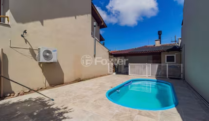 Casa com 3 quartos à venda na Rua Guatambu, 331, Hípica, Porto Alegre, 210 m2 por R$ 1.045.000