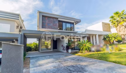 Casa em condomínio fechado com 3 quartos à venda na Avenida Senador Salgado Filho, 8450, Querência, Viamão, 300 m2 por R$ 1.920.000