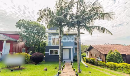 Casa em condomínio fechado com 3 quartos à venda na Estrada Capitão Gentil Machado de Godoy, 4550, Vila Elsa, Viamão, 249 m2 por R$ 1.100.000
