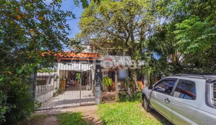 Casa com 5 quartos à venda na Avenida Vicente Monteggia, 2231, Cavalhada, Porto Alegre, 308 m2 por R$ 905.000