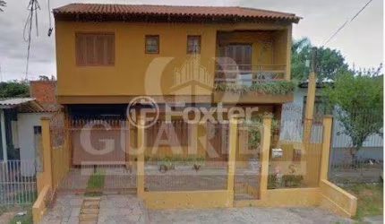 Casa com 3 quartos à venda na Avenida Antônio Giudice, 150, Morro Santana, Porto Alegre, 230 m2 por R$ 1.045.000
