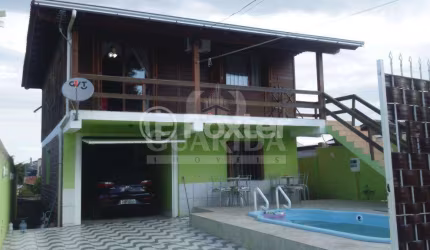 Casa com 2 quartos à venda na Rua Ênio de Souza, 39, Vila Nova, Porto Alegre, 120 m2 por R$ 373.000