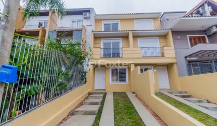 Casa com 3 quartos à venda na Rua Nestor José Nitschke, 38, Guarujá, Porto Alegre, 133 m2 por R$ 520.000