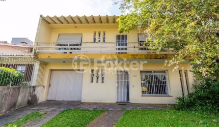 Casa com 3 quartos à venda na Avenida Teixeira Mendes, 315, Chácara das Pedras, Porto Alegre, 212 m2 por R$ 850.000