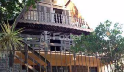 Casa com 3 quartos à venda na Rua Doutor Prudente de Moraes, 249, Chácara das Pedras, Porto Alegre, 435 m2 por R$ 1.000.000