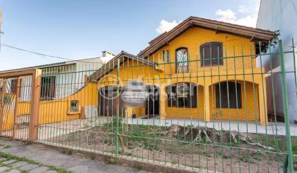 Casa com 4 quartos à venda na Rua Alfredo Silveira Dias, 169, Nonoai, Porto Alegre, 240 m2 por R$ 960.000