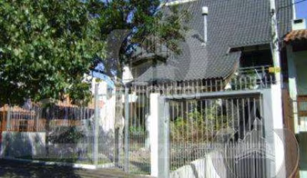 Casa com 4 quartos à venda na Rua Doutor Castro de Menezes, 943, Vila Assunção, Porto Alegre, 506 m2 por R$ 1.140.000