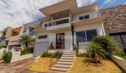 Casa em condomínio fechado com 4 quartos à venda na Rua Francisco Solano Borges, 200, Hípica, Porto Alegre, 270 m2 por R$ 750.000
