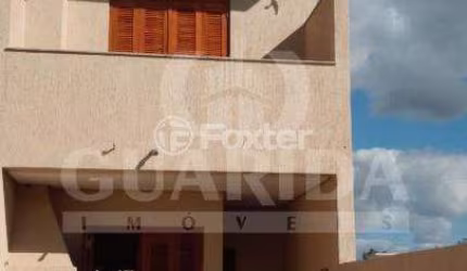 Casa com 2 quartos à venda na Rua Heitor Kramer, 640, Guarujá, Porto Alegre, 124 m2 por R$ 430.000