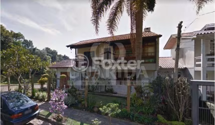 Casa com 3 quartos à venda na Rua Olécio Cavedini, 255, Espírito Santo, Porto Alegre, 159 m2 por R$ 980.000