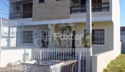 Casa com 3 quartos à venda na Rua Embira, 98, Hípica, Porto Alegre por R$ 498.000
