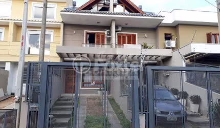 Casa com 3 quartos à venda na Rua Nestor José Nitschke, 48, Guarujá, Porto Alegre, 135 m2 por R$ 460.000