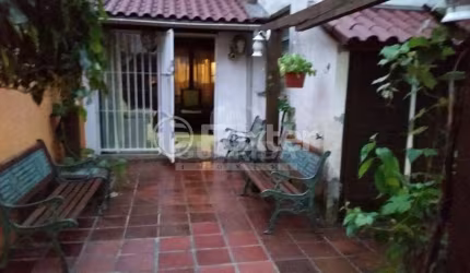 Casa com 5 quartos à venda na Rua Bernardo Pires, 486, Santana, Porto Alegre, 400 m2 por R$ 1.390.000