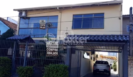 Casa com 3 quartos à venda na Estrada Vila Maria, 75, Cavalhada, Porto Alegre por R$ 800.000