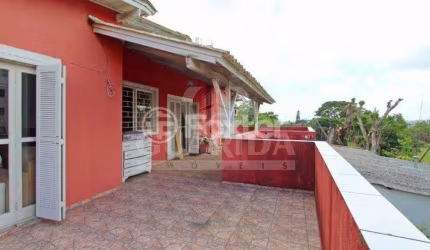 Casa com 4 quartos à venda na Avenida Cinco de Novembro, 346, Teresópolis, Porto Alegre, 180 m2 por R$ 490.000