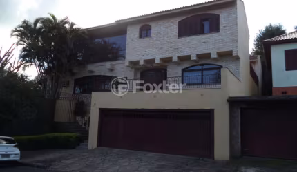 Casa com 4 quartos à venda na Rua dos Guenoas, 501, Guarujá, Porto Alegre, 720 m2 por R$ 1.600.000