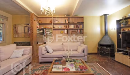 Casa com 3 quartos à venda na Rua Carlos Trein Filho, 460, Auxiliadora, Porto Alegre, 270 m2 por R$ 1.235.000