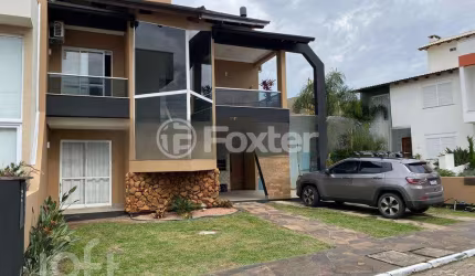 Casa em condomínio fechado com 3 quartos à venda na Rua Eroni Soares Machado, 300, Hípica, Porto Alegre, 170 m2 por R$ 899.000