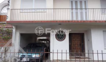 Casa com 4 quartos à venda na Rua Doutor Jorge Fayet, 672, Chácara das Pedras, Porto Alegre, 275 m2 por R$ 900.000