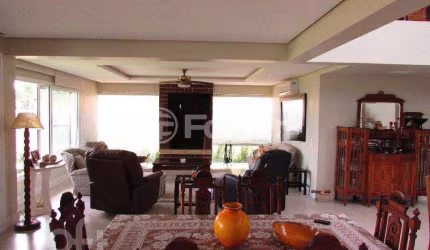 Casa em condomínio fechado com 4 quartos à venda na Avenida Juca Batista, 9000, Belém Novo, Porto Alegre, 573 m2 por R$ 2.631.000