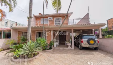 Casa com 3 quartos à venda na Avenida Capivari, 391, Cristal, Porto Alegre, 300 m2 por R$ 1.590.000