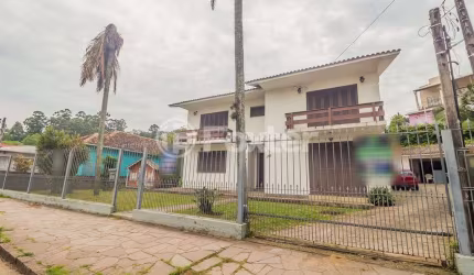 Casa com 4 quartos à venda na Rua Irmã Ambrósio, 55, Jardim Carvalho, Porto Alegre, 351 m2 por R$ 997.500