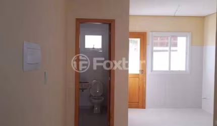 Casa com 3 quartos à venda na Rua Itacyr Rossi, 195, Guarujá, Porto Alegre, 126 m2 por R$ 475.000