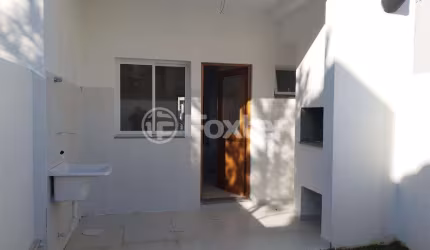 Casa com 3 quartos à venda na Rua Itacyr Rossi, 191, Guarujá, Porto Alegre, 126 m2 por R$ 500.000