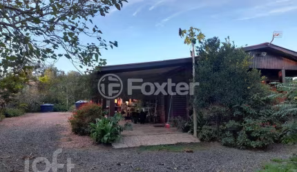 Casa com 3 quartos à venda na Rua Oito Mil e Quatorze, 293, Lageado, Porto Alegre, 104 m2 por R$ 350.000