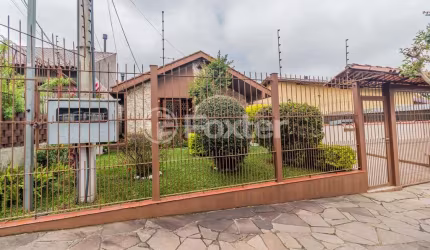 Casa com 4 quartos à venda na Rua Doutor Mário Totta, 2901, Tristeza, Porto Alegre, 305 m2 por R$ 650.500