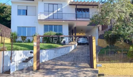 Casa com 3 quartos à venda na Rua Tristão de Alencar, 553, Primavera, Novo Hamburgo, 240 m2 por R$ 799.000