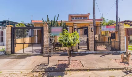 Casa com 3 quartos à venda na Rua Carmense, 165, Parque Santa Fé, Porto Alegre, 218 m2 por R$ 650.000