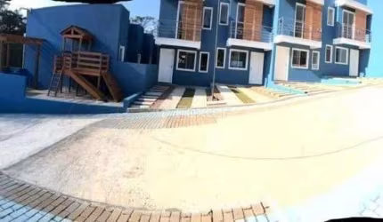 Casa em condomínio fechado com 2 quartos à venda na Rua Pero Vaz de Caminha, 177, Tarumã, Viamão, 52 m2 por R$ 235.000