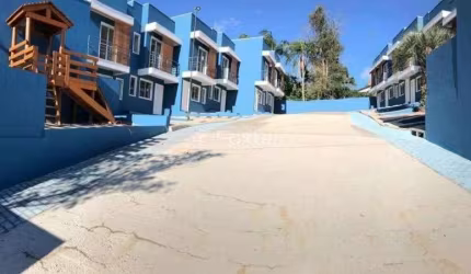 Casa em condomínio fechado com 2 quartos à venda na Rua Pero Vaz de Caminha, 177, Tarumã, Viamão, 52 m2 por R$ 220.000