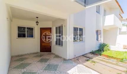 Casa em condomínio fechado com 3 quartos à venda na Avenida Prefeito Barreto Viana, 402, Cecília, Viamão, 75 m2 por R$ 276.900