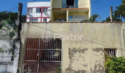 Casa com 7 quartos à venda na Rua Teixeira de Freitas, 348, Santo Antônio, Porto Alegre, 539 m2 por R$ 583.000