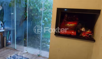 Casa com 3 quartos à venda na Rua Hugo Nelson Magalhães, 141, Parque Santa Fé, Porto Alegre, 152 m2 por R$ 429.000