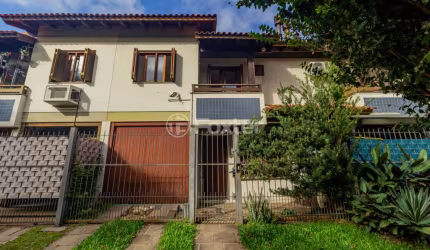 Casa em condomínio fechado com 3 quartos à venda na Rua Itapitocaí, 1031, Cristal, Porto Alegre, 105 m2 por R$ 430.000
