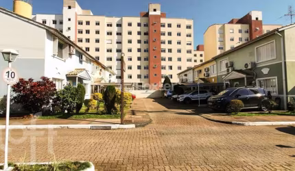 Casa em condomínio fechado com 3 quartos à venda na Avenida Santos Ferreira, 1180, Marechal Rondon, Canoas, 78 m2 por R$ 370.000