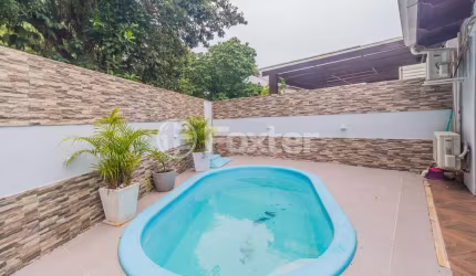 Casa em condomínio fechado com 4 quartos à venda na Estrada João Salomoni, 600, Vila Nova, Porto Alegre, 191 m2 por R$ 990.000