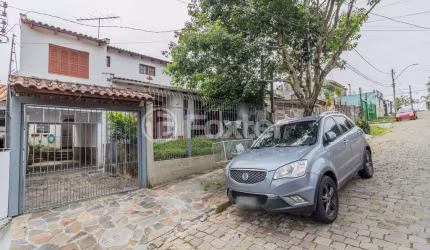 Casa com 3 quartos à venda na Rua Affonso Fortis, 65, Vila Nova, Porto Alegre, 207 m2 por R$ 399.000