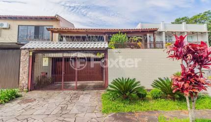 Casa com 4 quartos à venda na Rua Lloyd de Andrade Polidoro, 45, Ipanema, Porto Alegre, 237 m2 por R$ 845.500