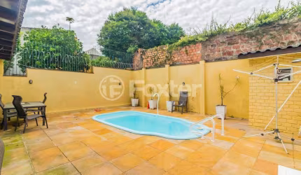 Casa com 3 quartos à venda na Rua Lloyd de Andrade Polidoro, 55, Ipanema, Porto Alegre, 239 m2 por R$ 807.500