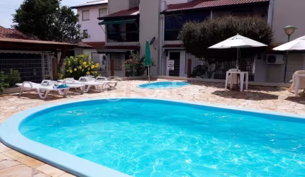 Casa em condomínio fechado com 2 quartos à venda na Rua Dos Cravos, 3705, Capão Novo, Capão da Canoa, 67 m2 por R$ 340.000