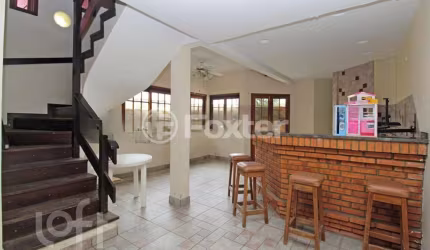 Casa em condomínio fechado com 4 quartos à venda na Rua Carlos Ferreira, 130, Teresópolis, Porto Alegre, 242 m2 por R$ 990.000